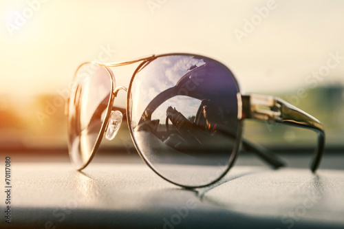 Driver mirorred in sun glasses photo