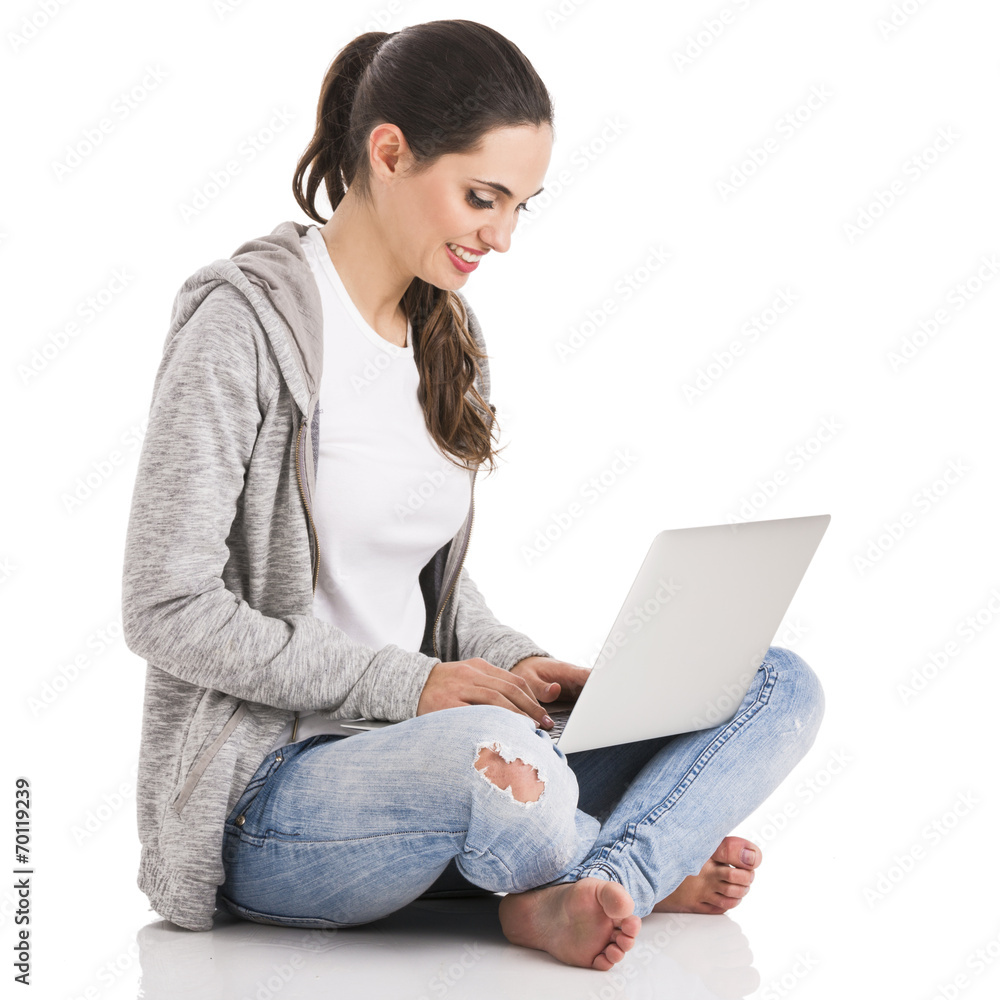 Naklejka premium Female student with a laptop