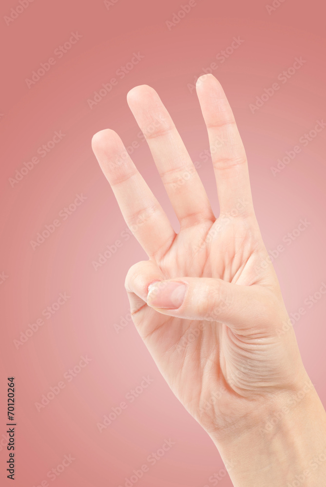 Female hands counting number three isolated on white Female hands counting number three isolated on white