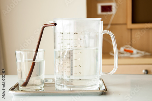 Glass of water in hospital room