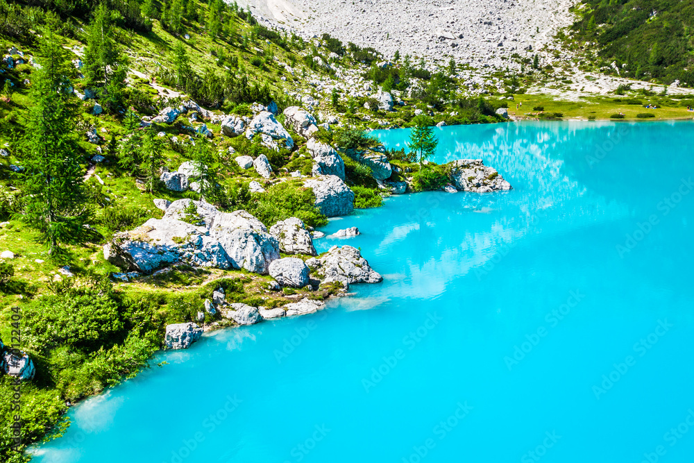 Turquoise Sorapis Lake with Pine Trees and Dolomite Mountains in