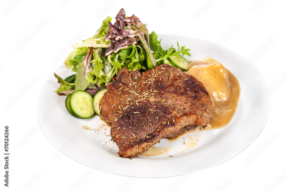 Rump steak with mashed potatoes and mix vegetable on plate