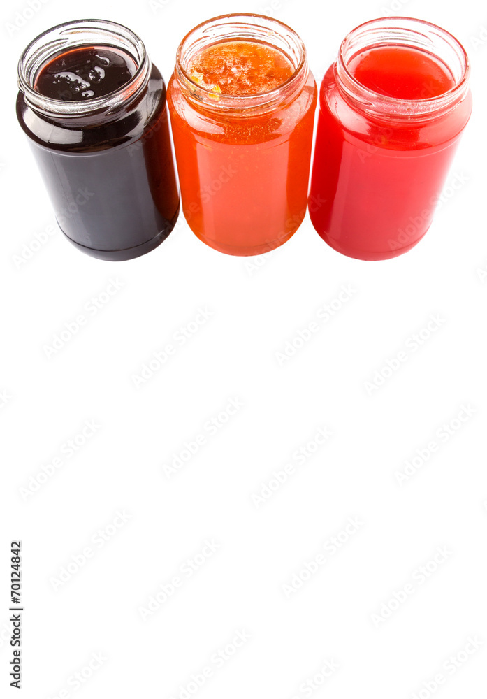 Blueberry, strawberry and orange fruit open lid bottled jam Blueberry, strawberry and orange fruit open lid bottled jam