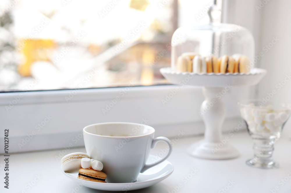 Coffee and sweets on the window Coffee and sweets on the window