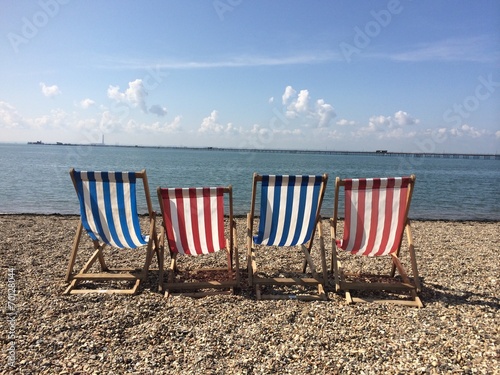desck chairs on the beach