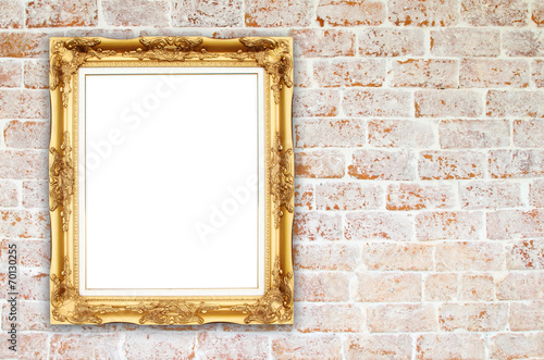 blank golden frame on brick stone wall © geargodz