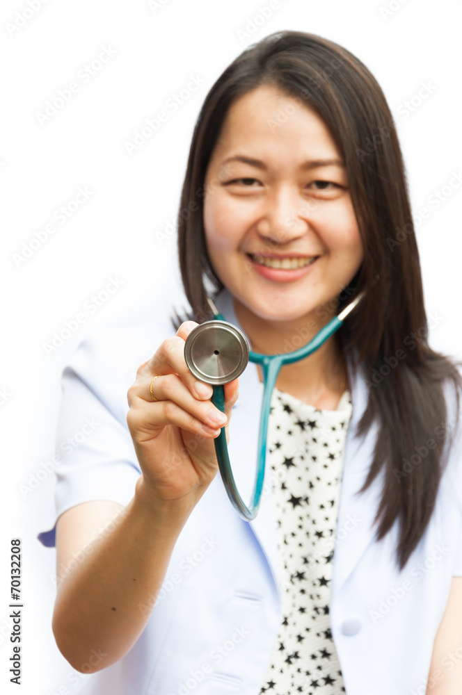 Happy female doctor holding out stethoscope Happy female doctor holding out stethoscope