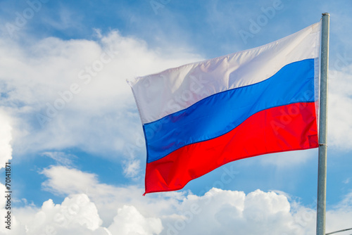 Photography Russian flag waving in the wind over sky