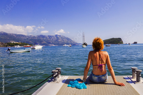 woman on the sea platform