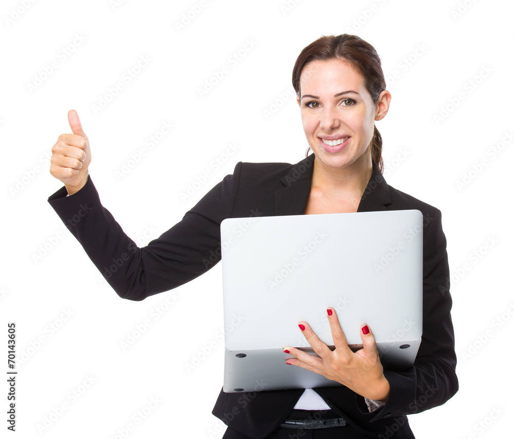 Businesswoman with notebook computer and thumb up Businesswoman with notebook computer and thumb up