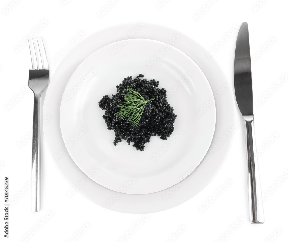 Black caviar on plate, fork and knife isolated on white Black caviar on plate, fork and knife isolated on white