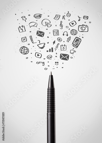 Pen close-up with social media icons photo