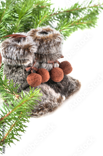 Winter boots with christmas tree photo