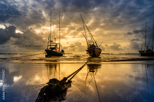 Fishing sea boat and Sunrise