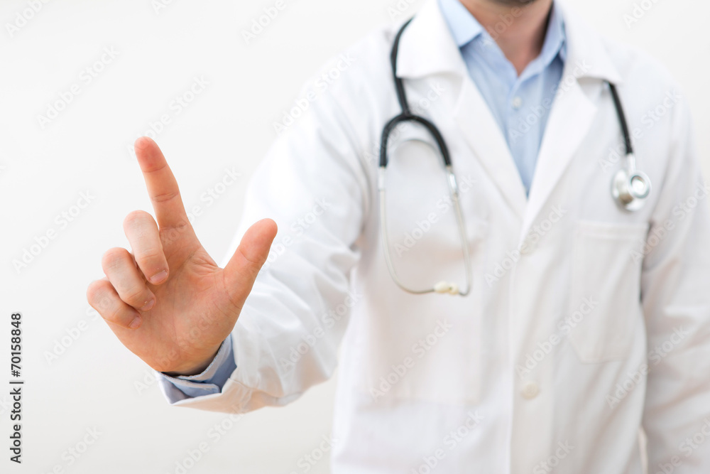 Professional doctor touching a touchscreen interface Professional doctor touching a touchscreen interface