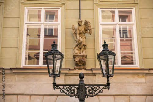 sculpture and street lighter in Prague