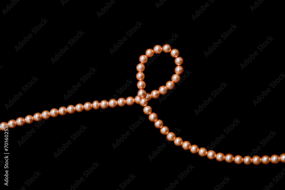 Orange pearl thread with single loop Orange pearl thread with single loop