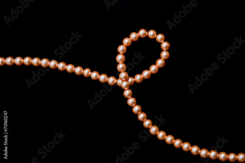 Decoration thread of orange pearls