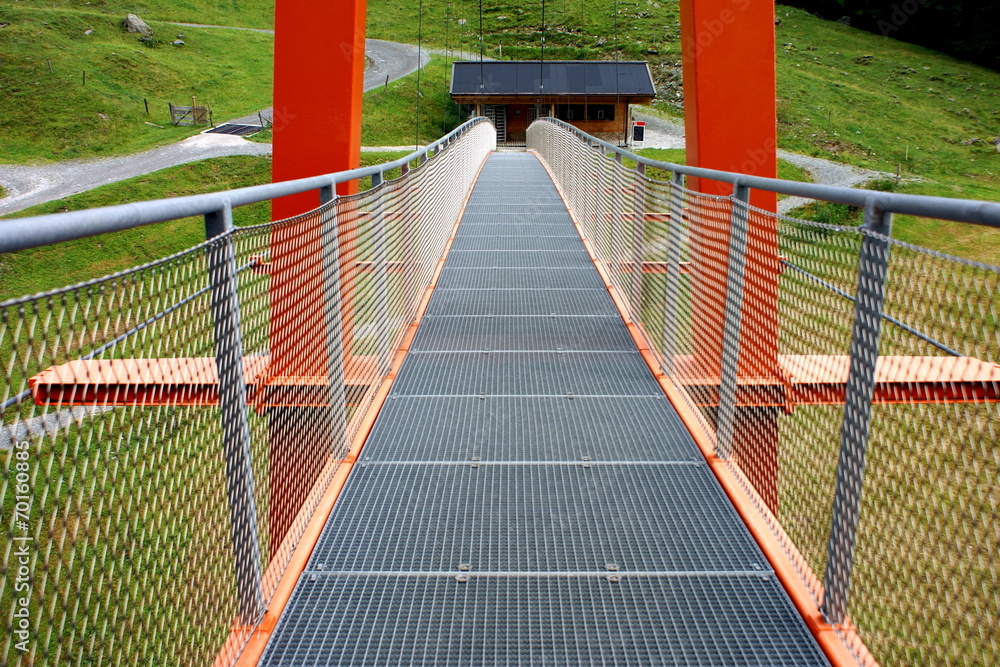 Pedestrian suspension bridge in Saalbach,Austria Pedestrian suspension bridge in Saalbach,Austria