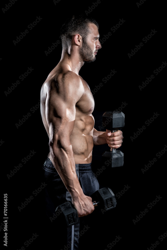 Man doing biceps curls in gym. Man doing biceps curls in gym.