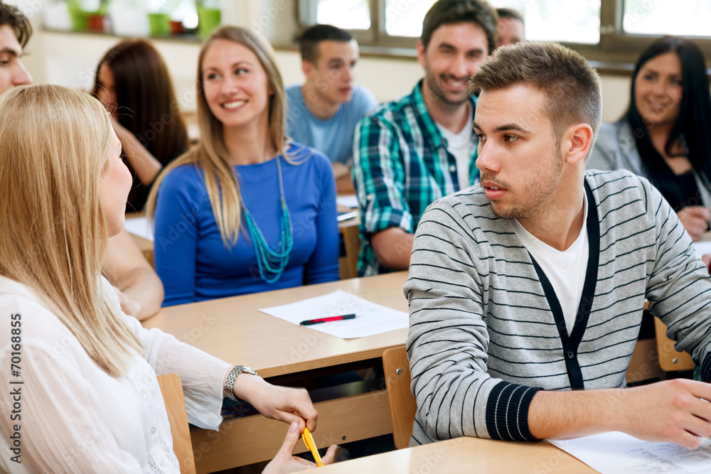 Obraz premium college students talking during class