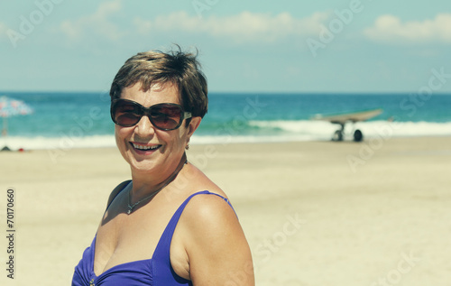 Portrait of senior woman on summer vacation at sea