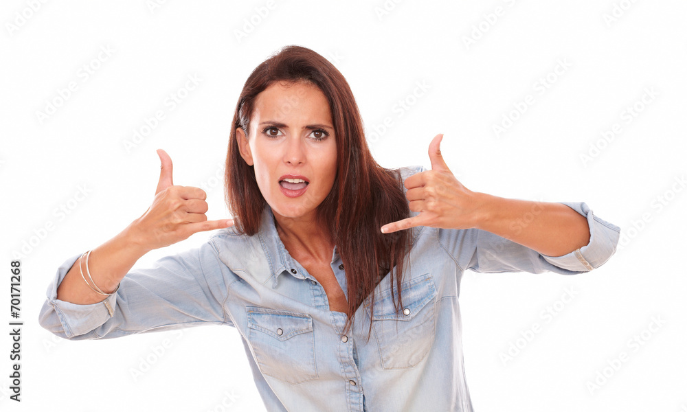 Adult brunette with calling sign looking at you Adult brunette with calling sign looking at you