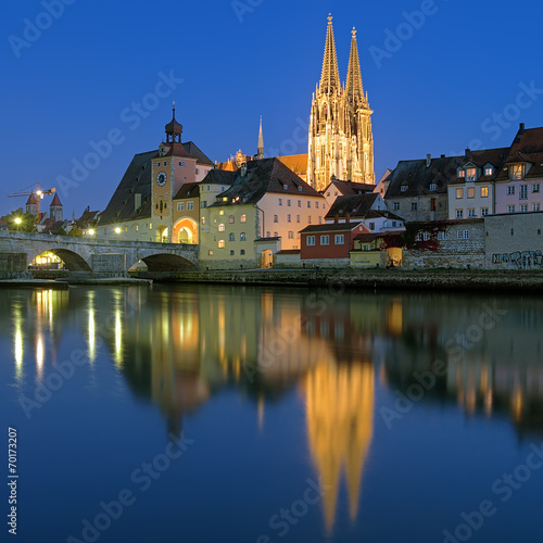 Cathedral and Stone Bridge in Regensburg at evening, Germany