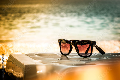 Sun glasses on a beach photo