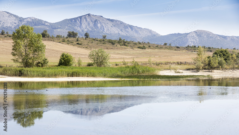 landscape with mountains and a lake with ducks landscape with mountains and a lake with ducks