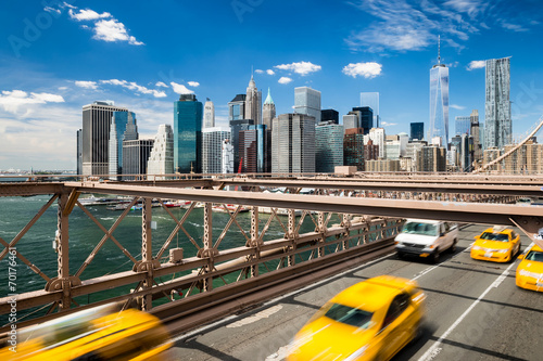 Billede på lærred Group of blurred typical yellow New York cabs