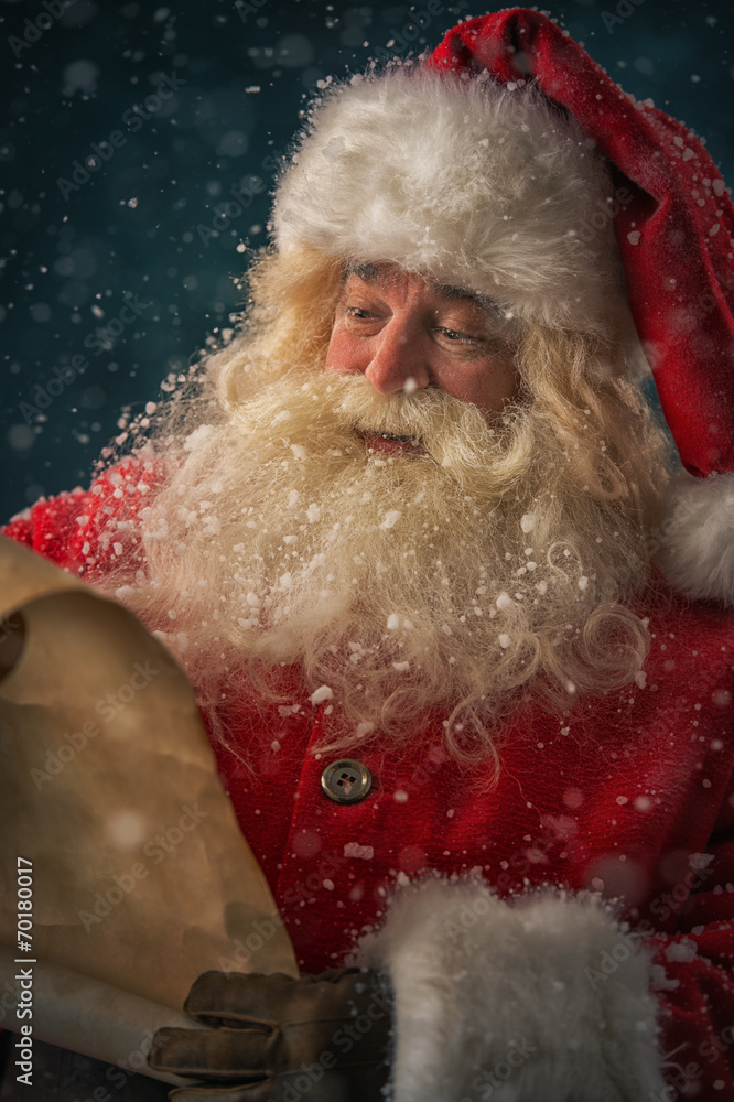 © Milles Studio - Santa Claus reading Christmas letter © Milles Studio - Santa Claus reading Christmas letter