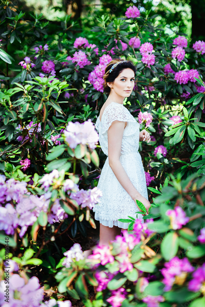 fashion beautiful girl in a flowers garden fashion beautiful girl in a flowers garden