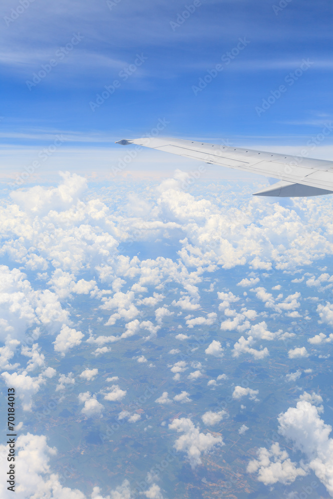 view from the airplane window, ocean blue view from the airplane window, ocean blue