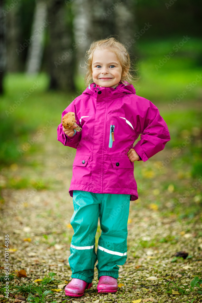 Happy little girl with a mushroom Happy little girl with a mushroom