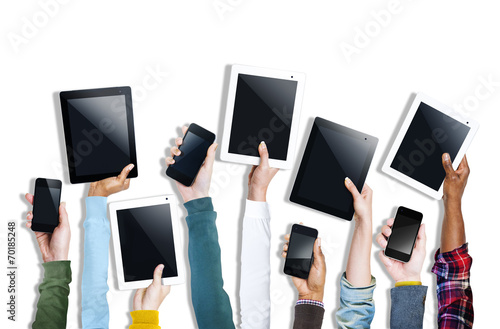 Group of Hands Holding Digital Devices