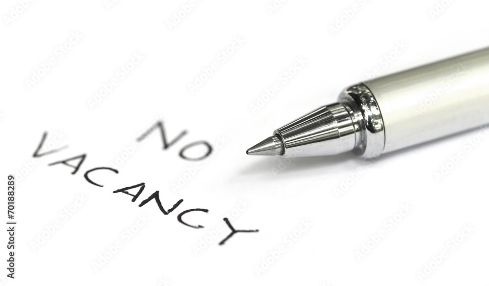 No vacancy written on a white paper No vacancy written on a white paper