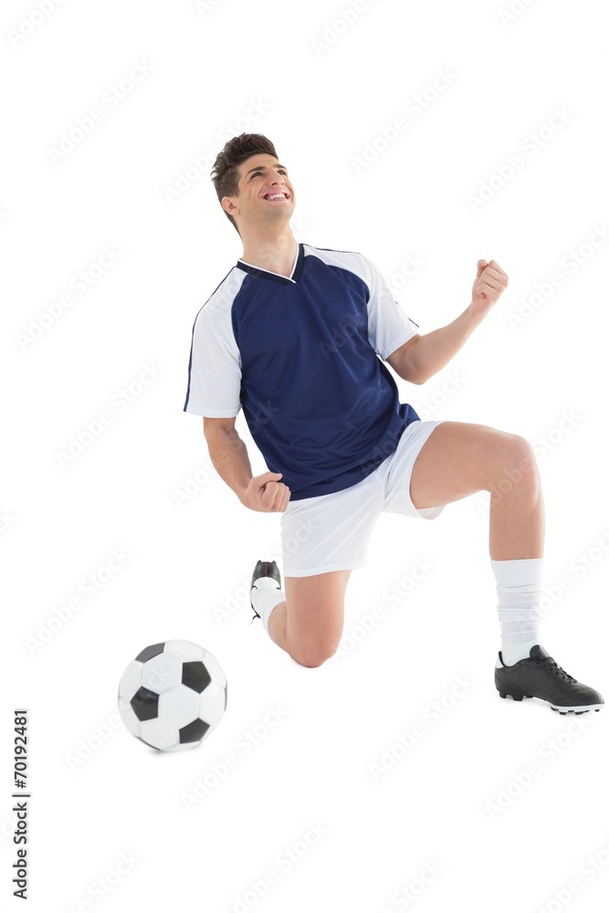 Athletic football player cheering