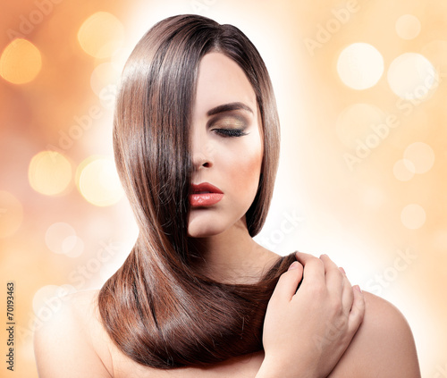 Beautiful young woman with ...