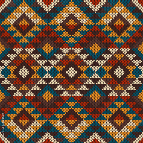 Traditional Tribal Aztec seamless pattern on the wool knitted te