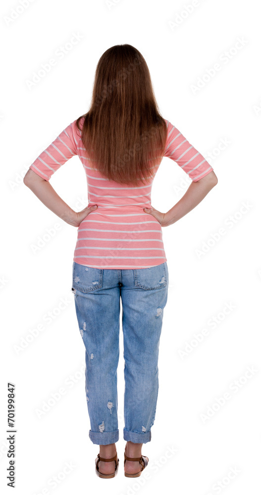 back view of standing young beautiful redhead woman. back view of standing young beautiful redhead woman.