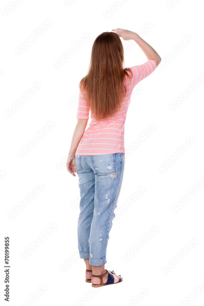 back view of standing young beautiful redhead woman. back view of standing young beautiful redhead woman.