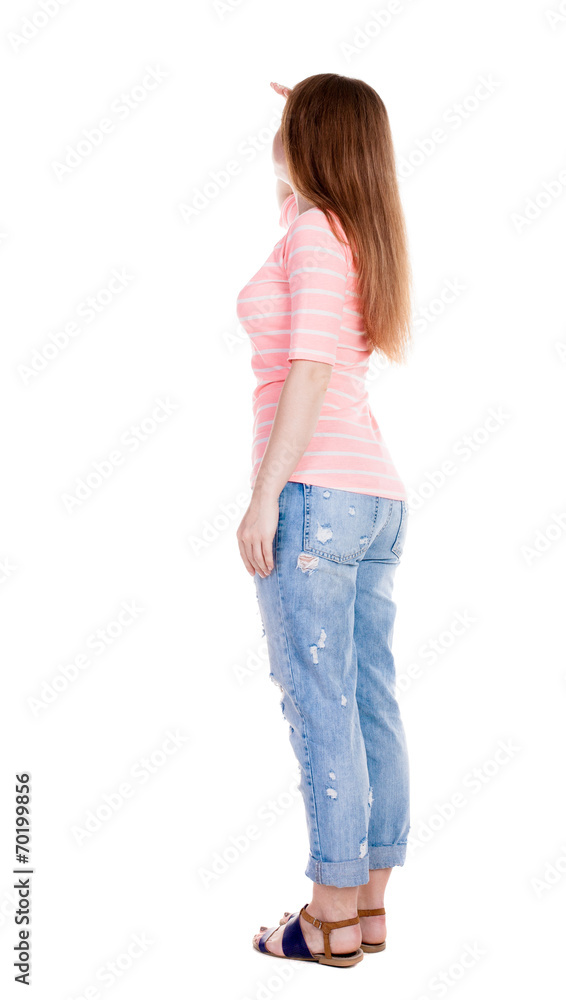 back view of standing young beautiful redhead woman. back view of standing young beautiful redhead woman.