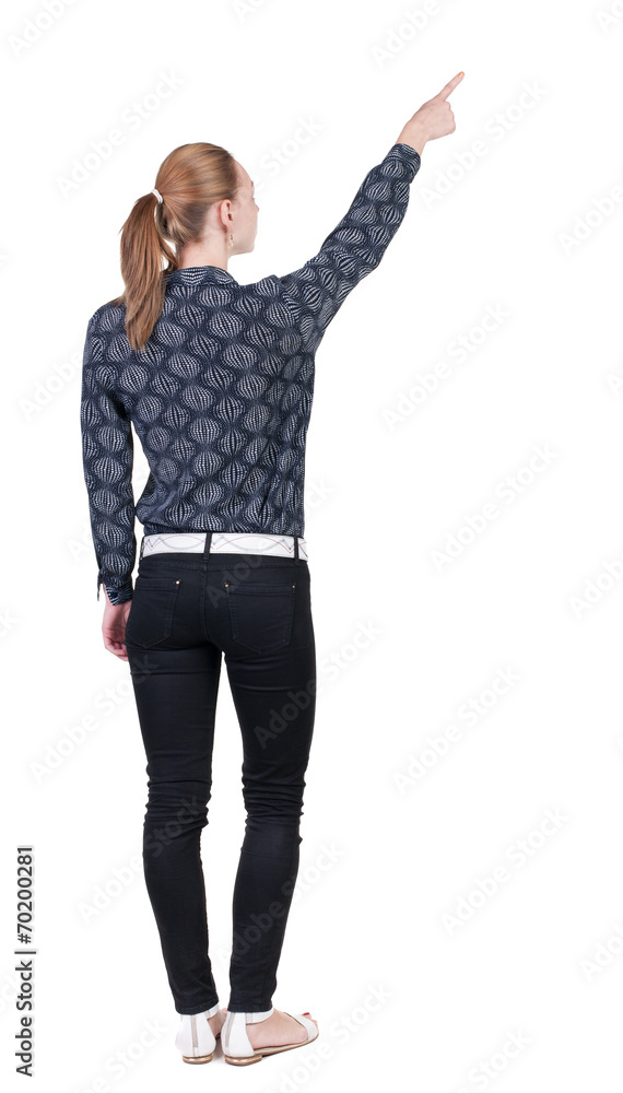 Back view of pointing woman. Back view of pointing woman.