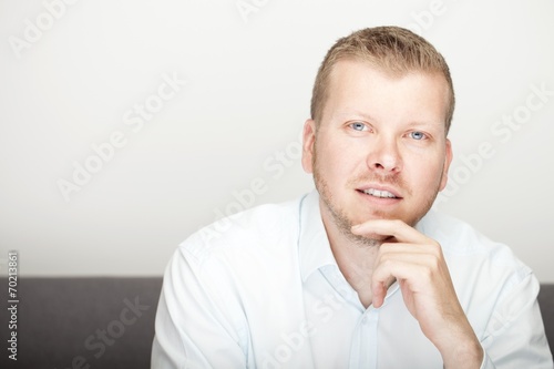 Pensive attractive young man