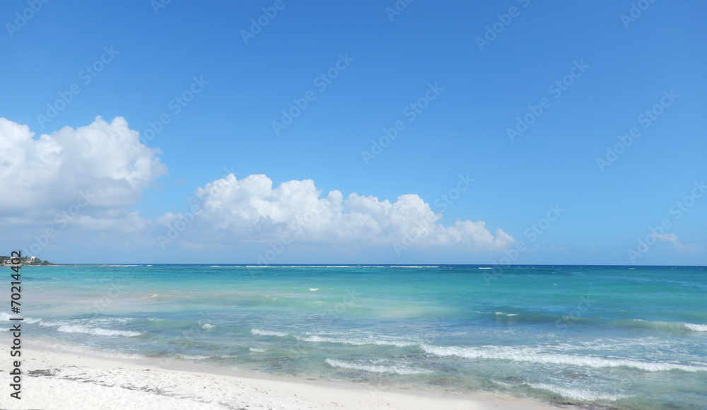 High sky and clouds over Caribbean beach