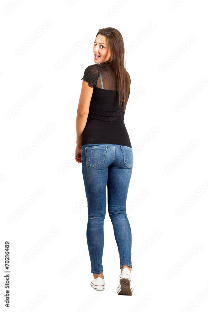 Back view posing woman with turned head. Back view posing woman with turned head.