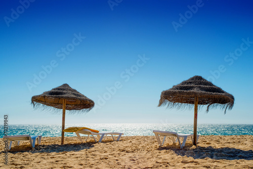 Umbrella at the shore of the Atlantic Ocean