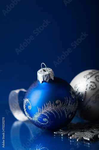 Wallpaper Mural Blue and silver christmas ornaments on dark blue xmas background Torontodigital.ca