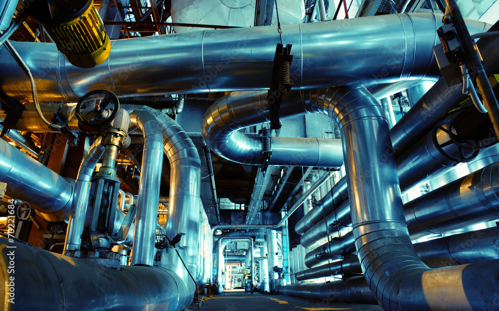 Equipment, cables and piping as found inside of a modern industr Equipment, cables and piping as found inside of a modern industr